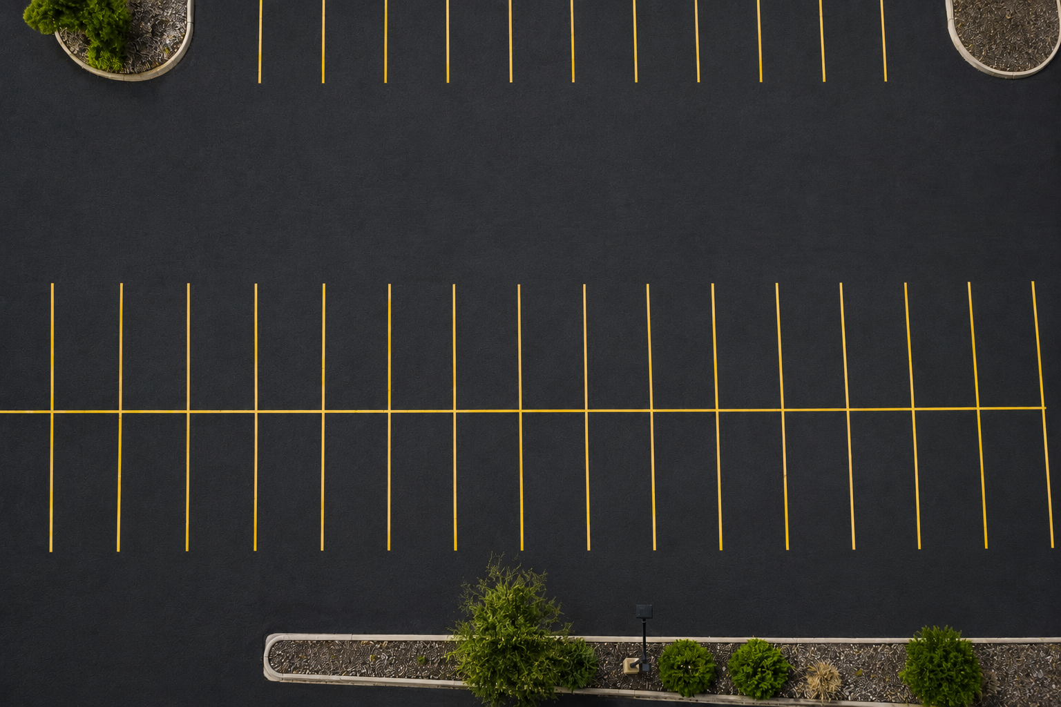 The same lot freshly striped by The Line Kings